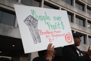 #PeopleOverProfit